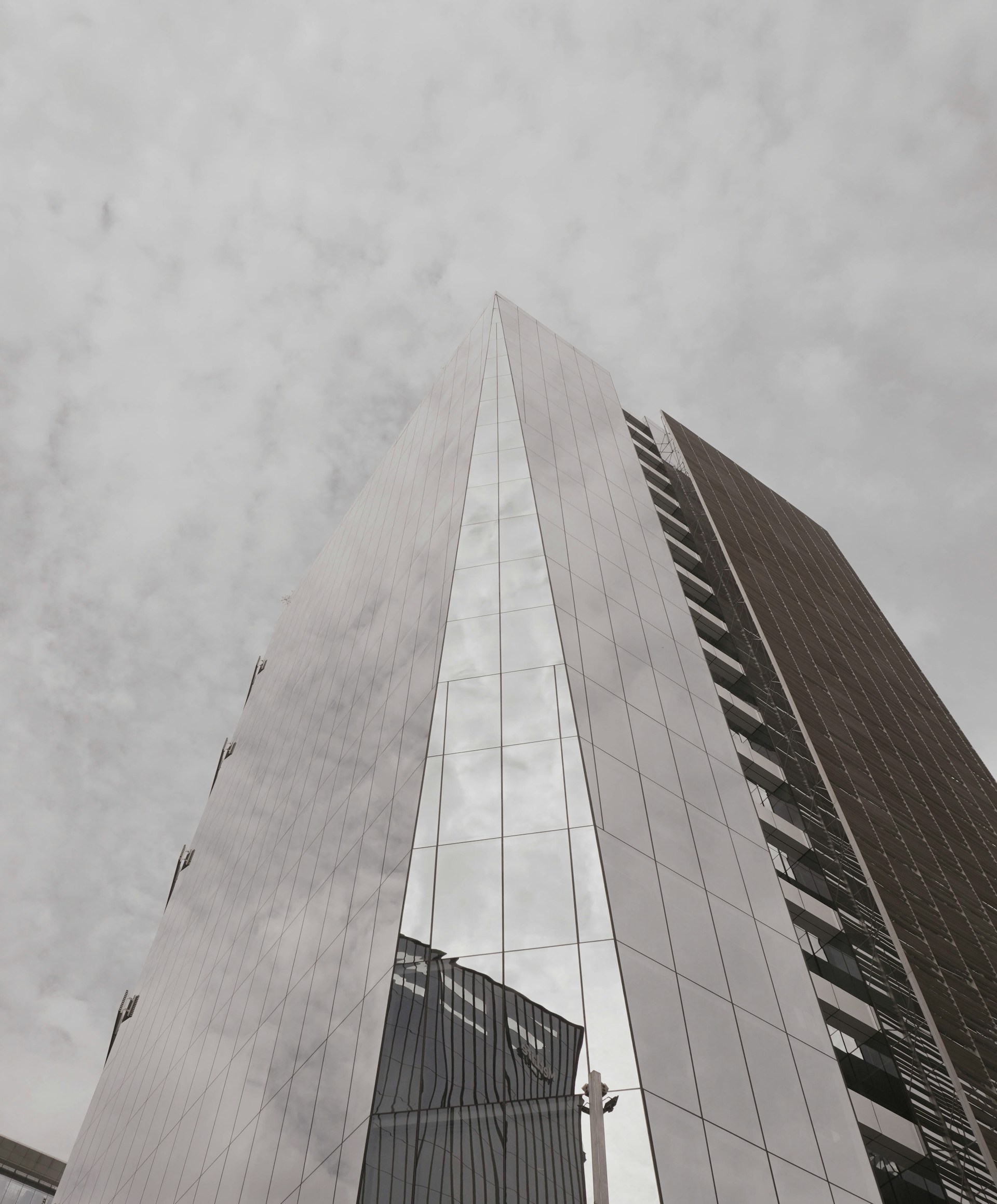 A very tall building with a sky background