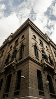 A tall building with a clock on the top of it