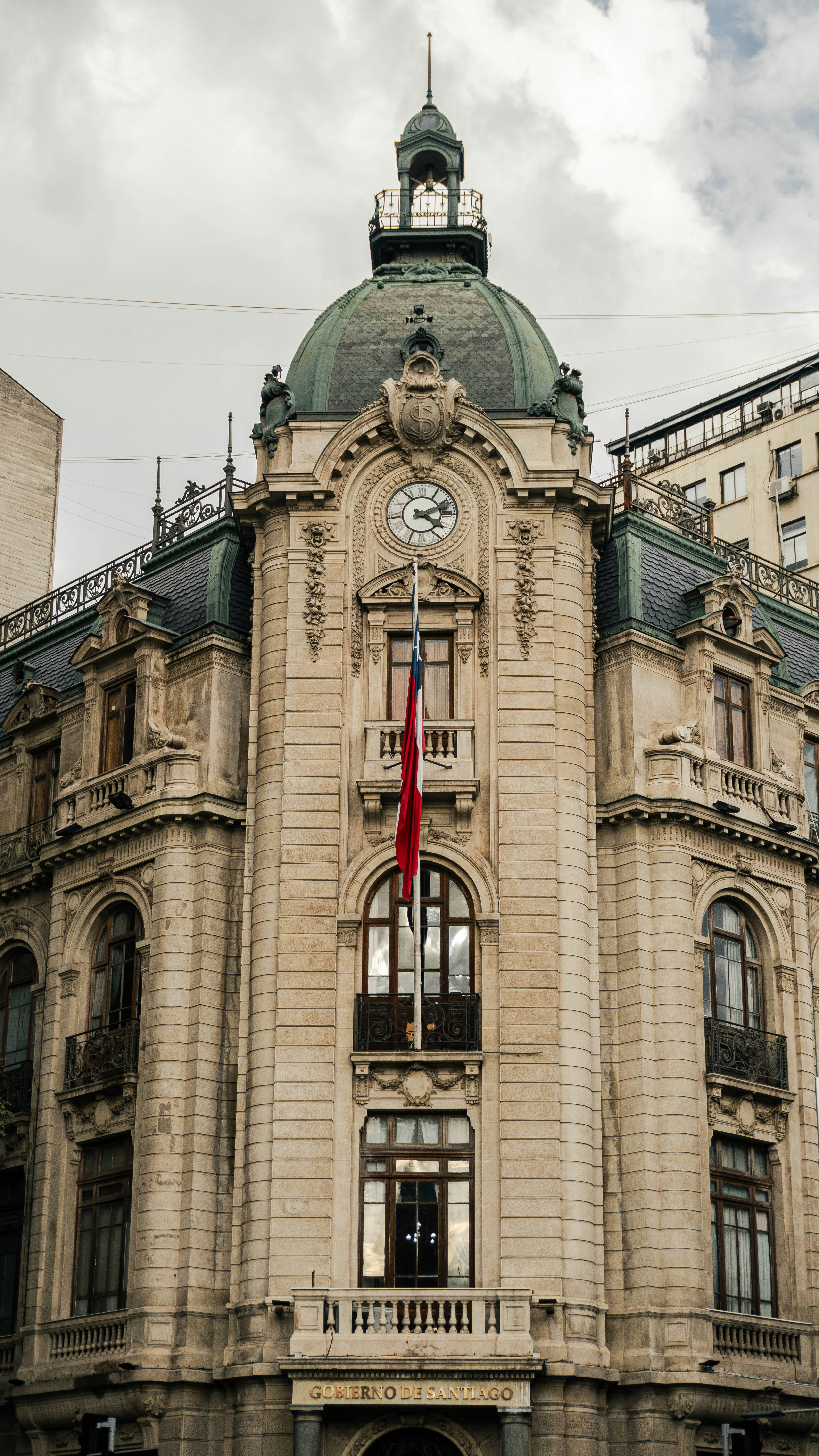 A large building with a clock on the top of it
