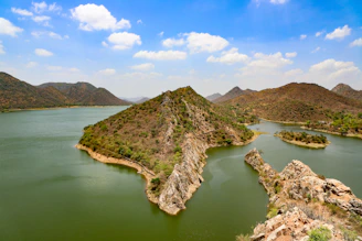 A large body of water surrounded by mountains
