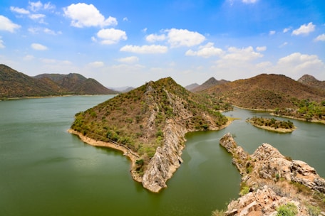 A large body of water surrounded by mountains