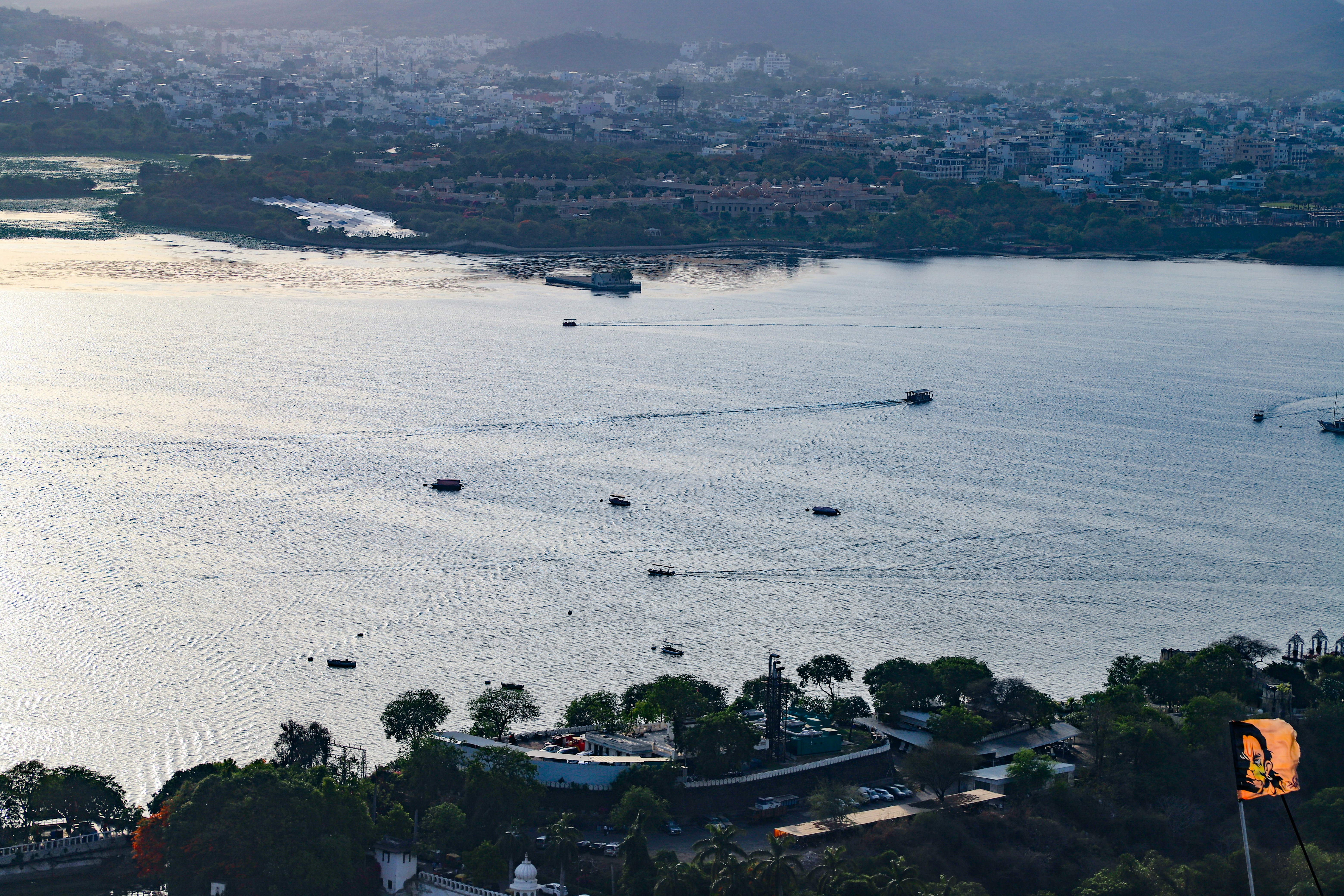 A large body of water surrounded by a city