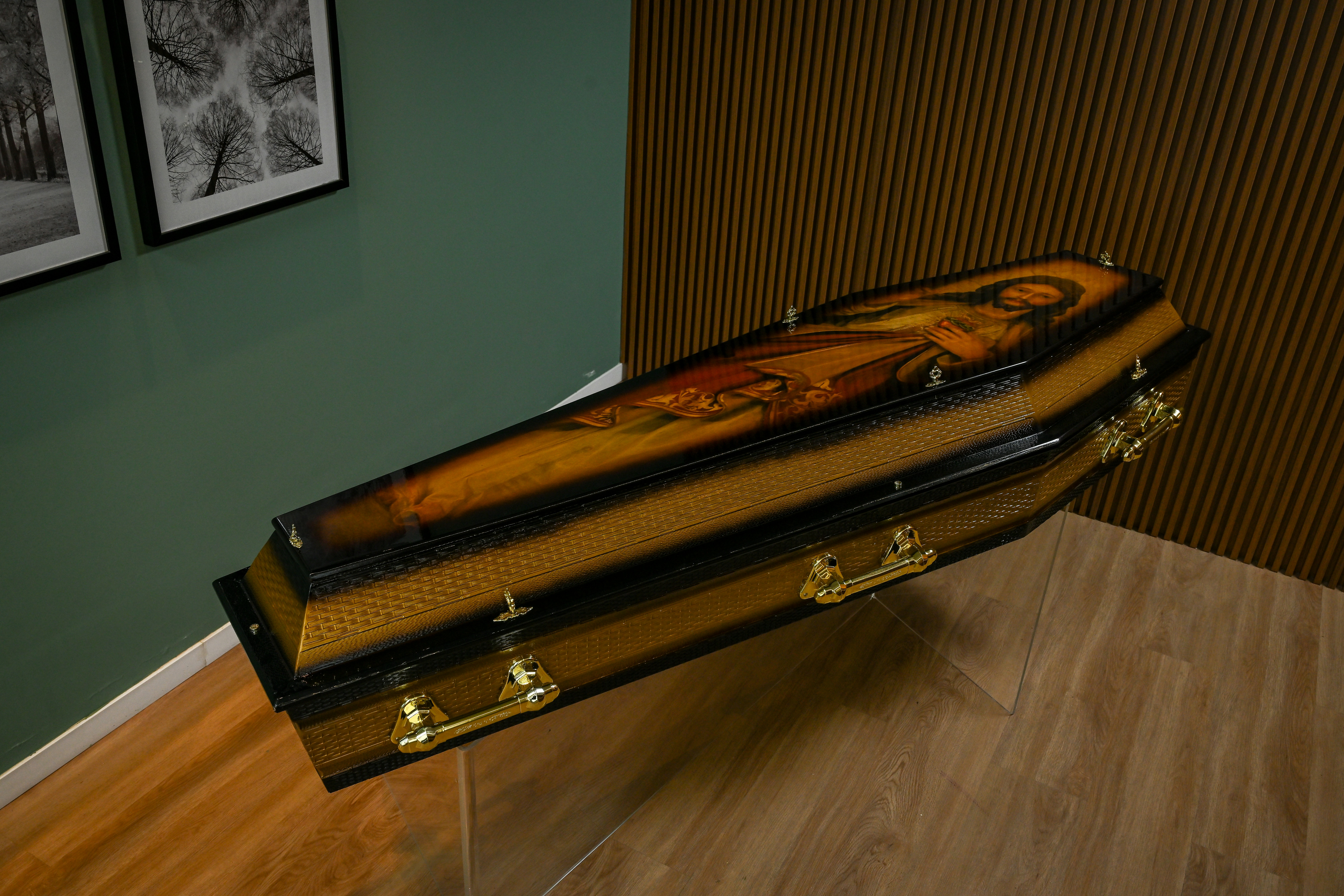 A guitar case sitting on top of a hard wood floor
