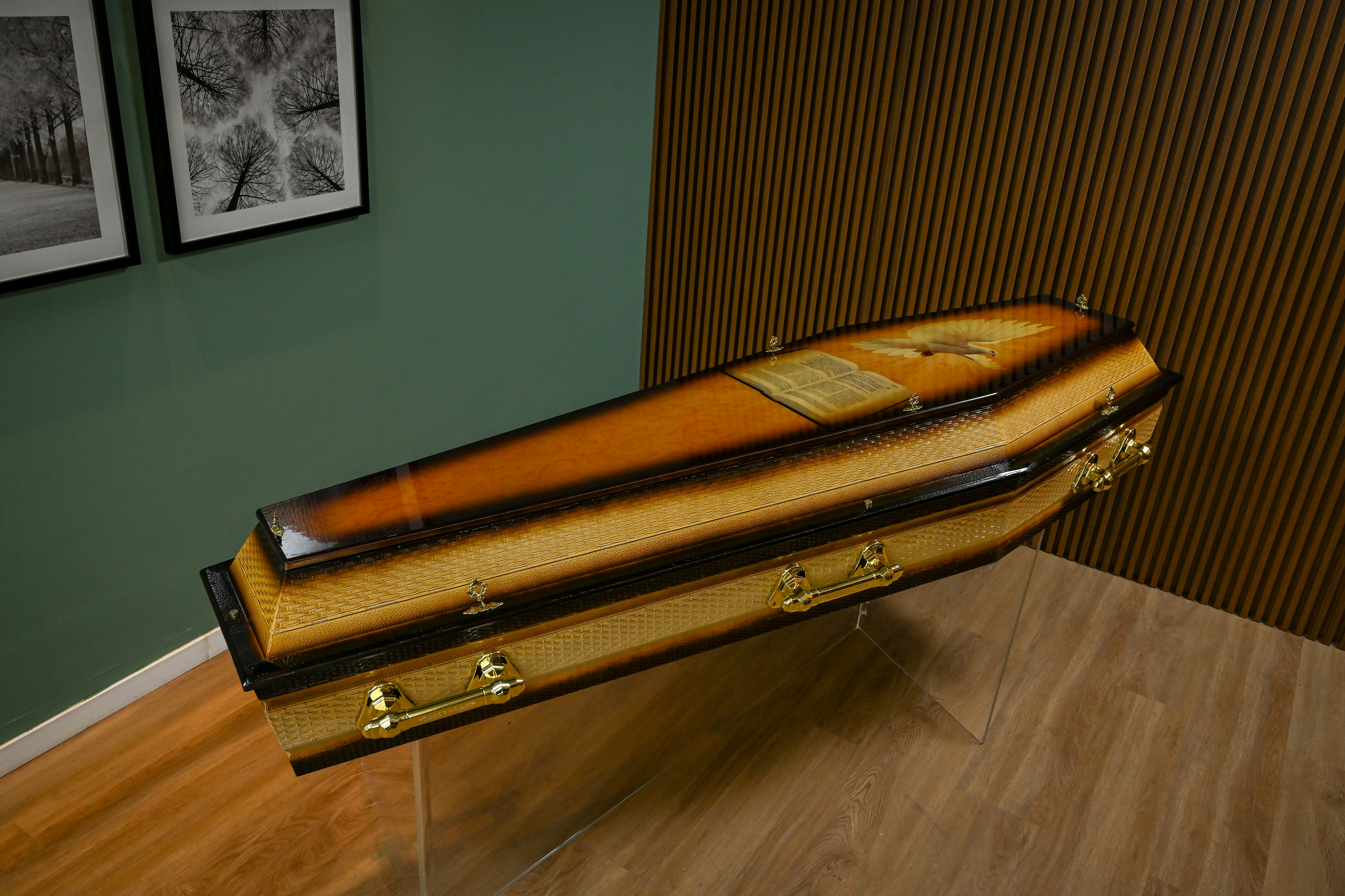 A wooden case sitting on top of a hard wood floor