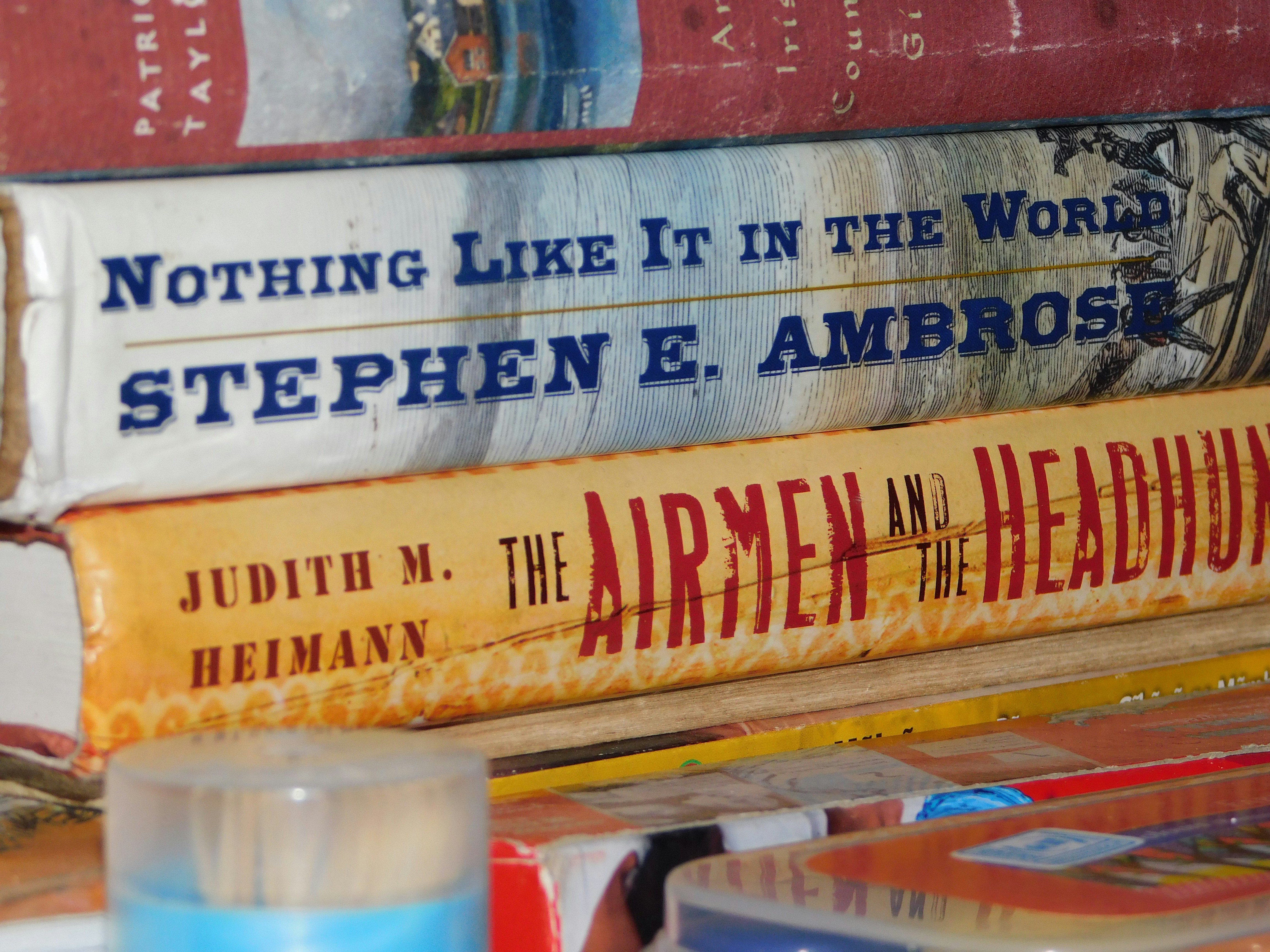 A stack of books sitting on top of a table
