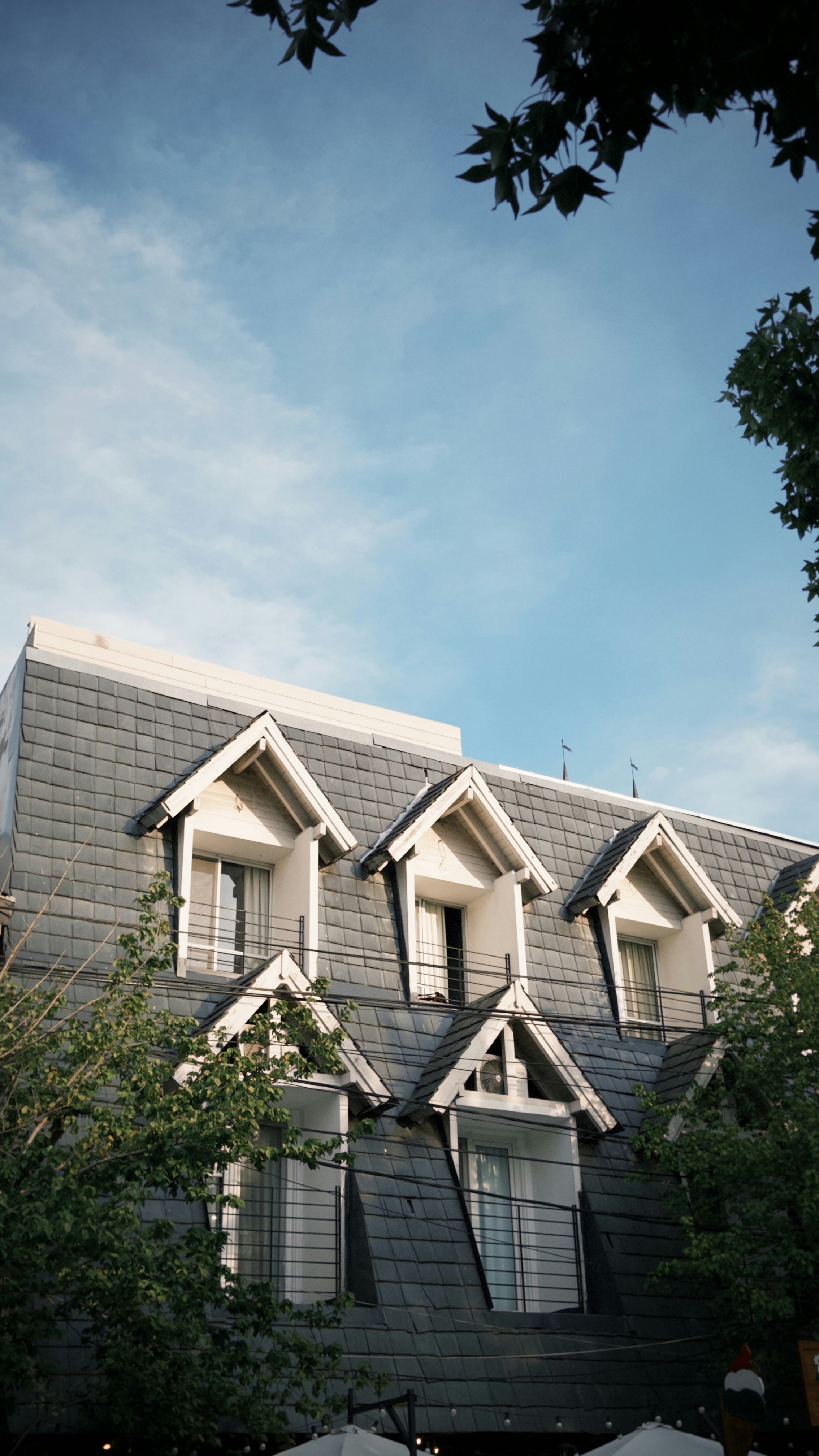 A large building with a bunch of windows on top of it