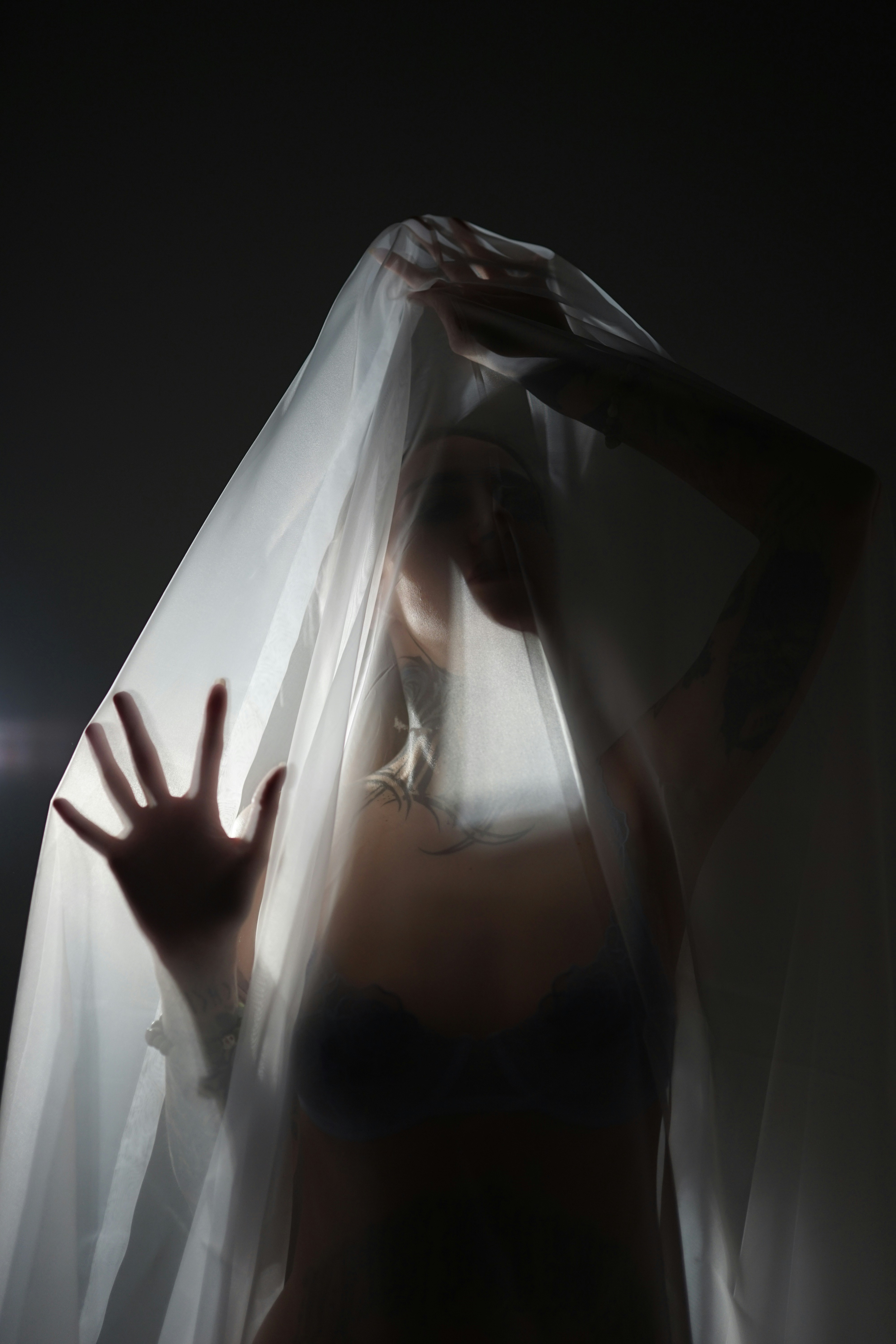 A woman with a veil on her head