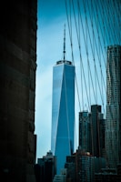 A very tall building towering over a city