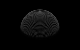 A black and white photo of an object in the dark