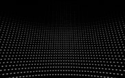 An abstract black and white background with lots of dots
