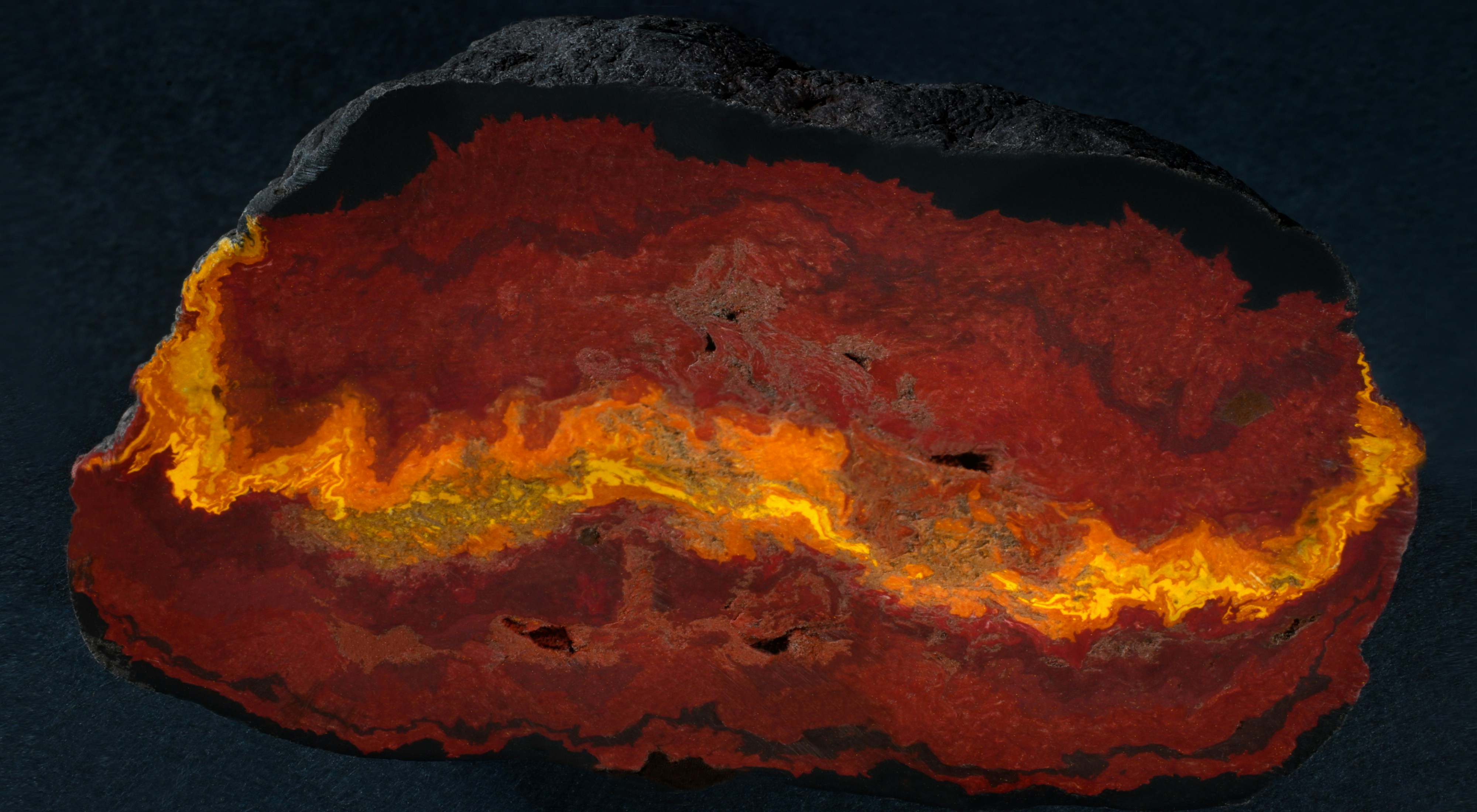 A close up of a rock on a black background