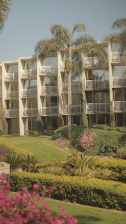 A large building with balconies and balconies on the top of it