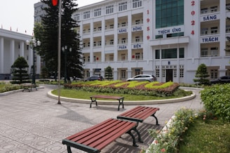 A couple of benches sitting in front of a building