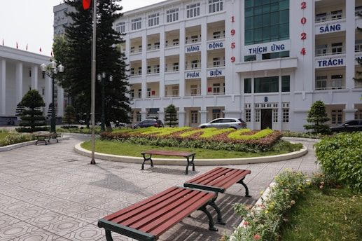 A couple of benches sitting in front of a building