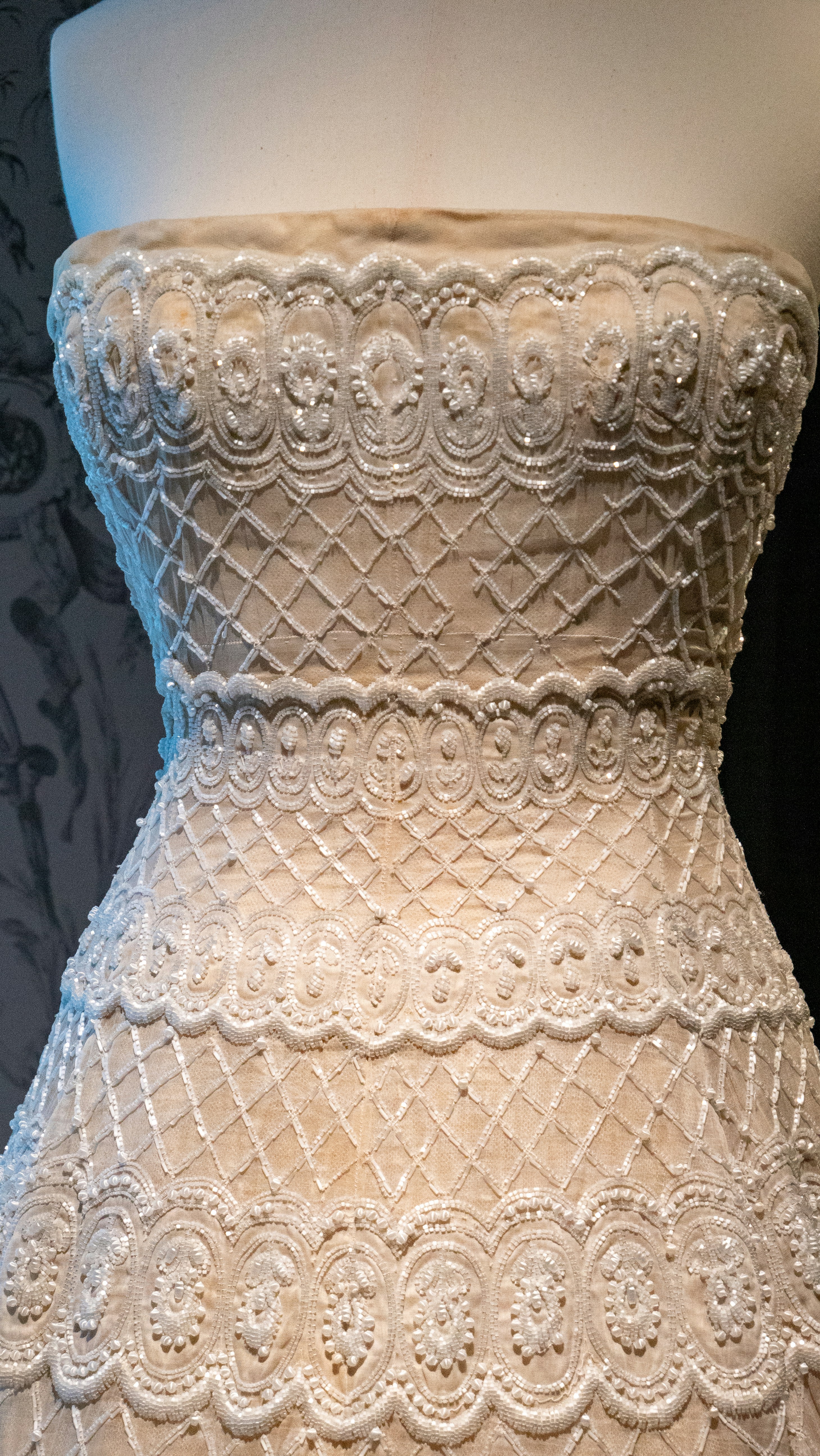 A white dress on display on a mannequin
