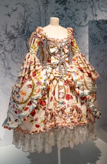 A dress on display in a glass case