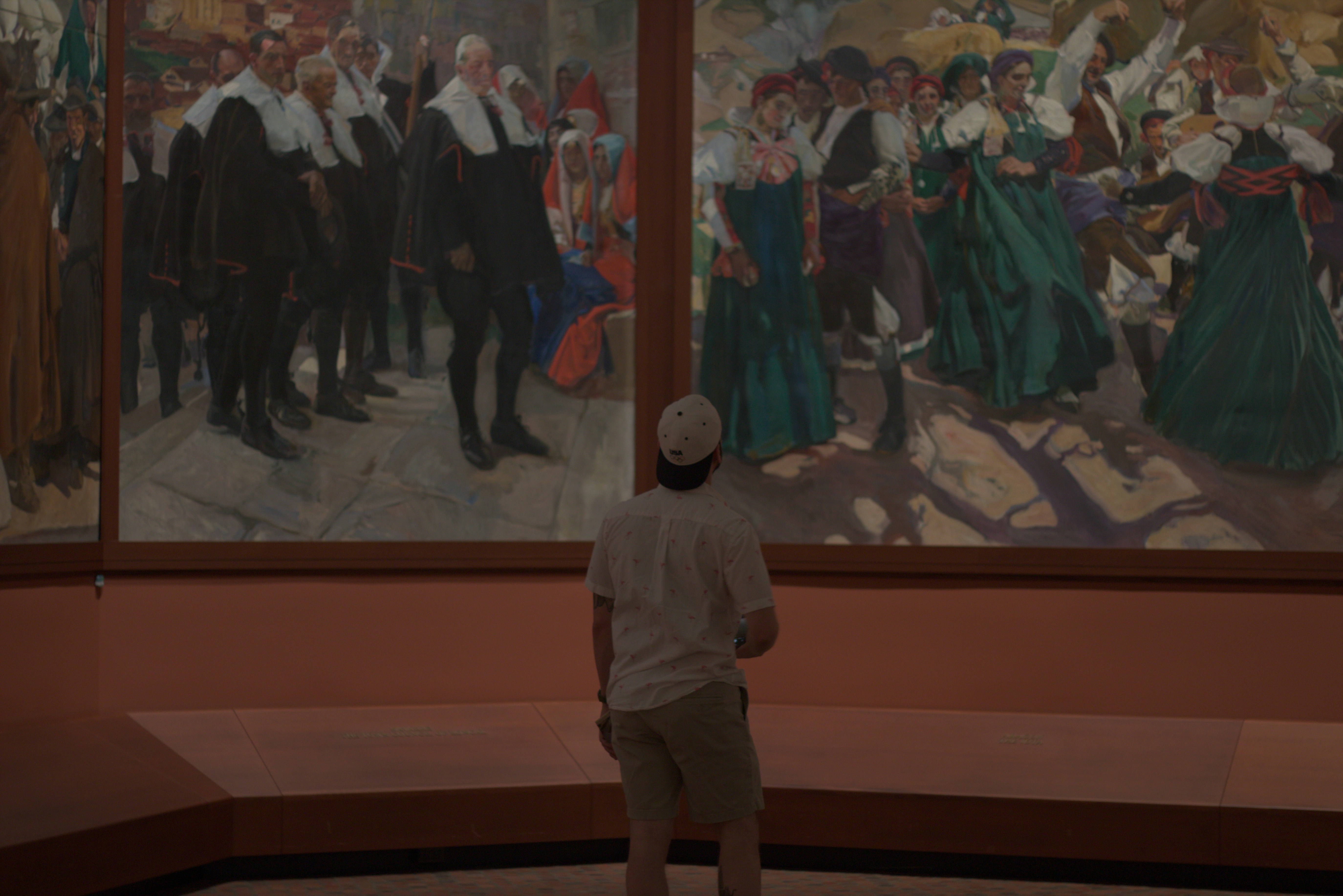 <li>4 Historical Moments When Art Changed Political Outcomes</li> – A man standing in front of a painting in a museum