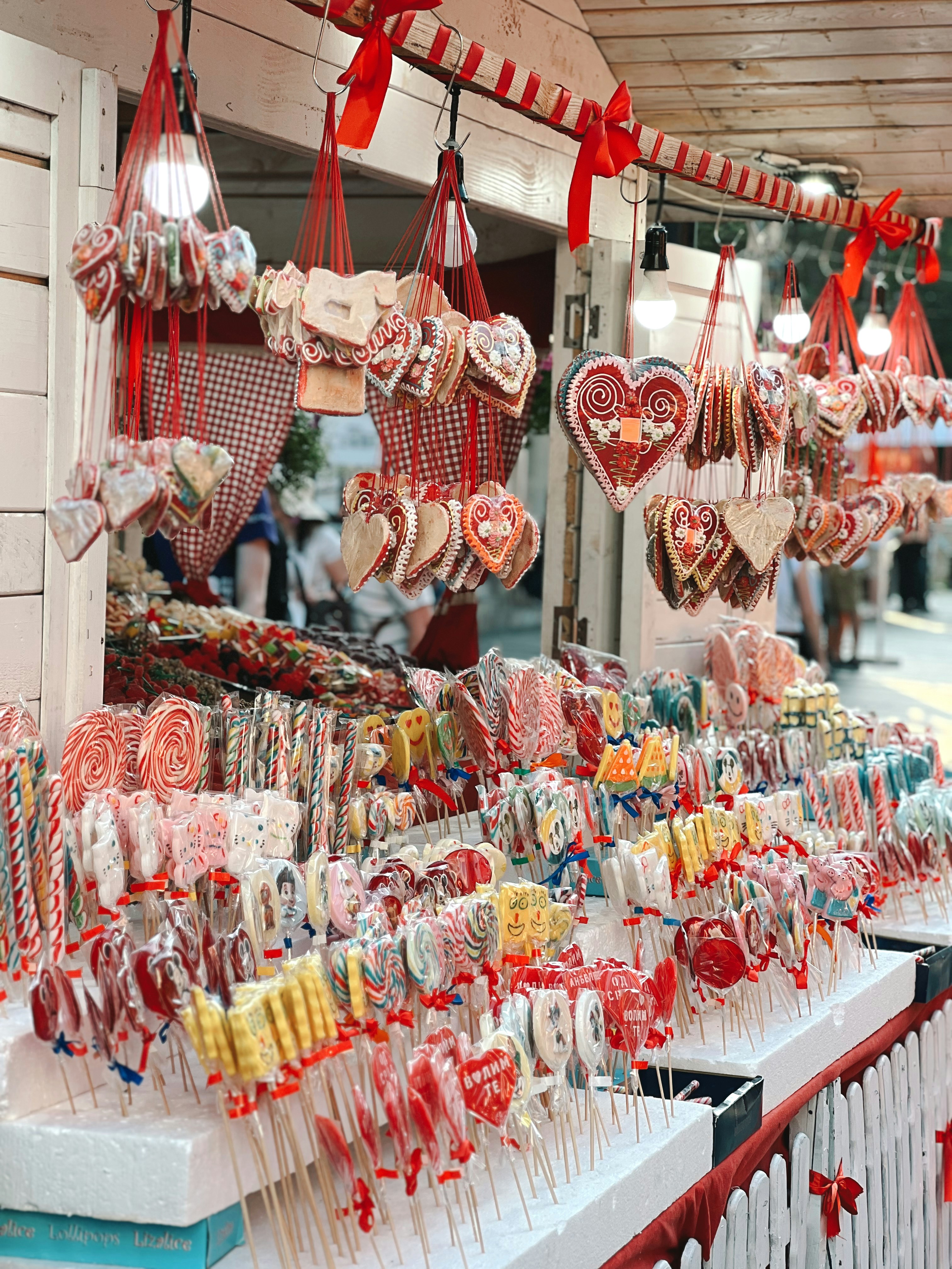 A display of heart shaped lollipops in a store