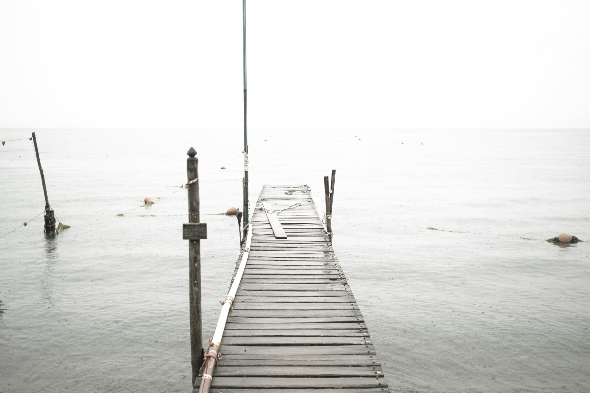 A long dock in the middle of a body of water