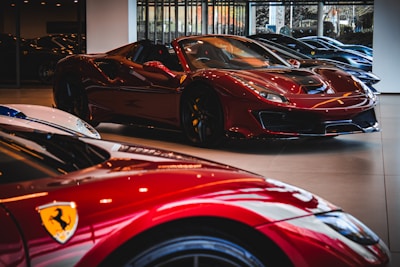 A row of sports cars in a showroom