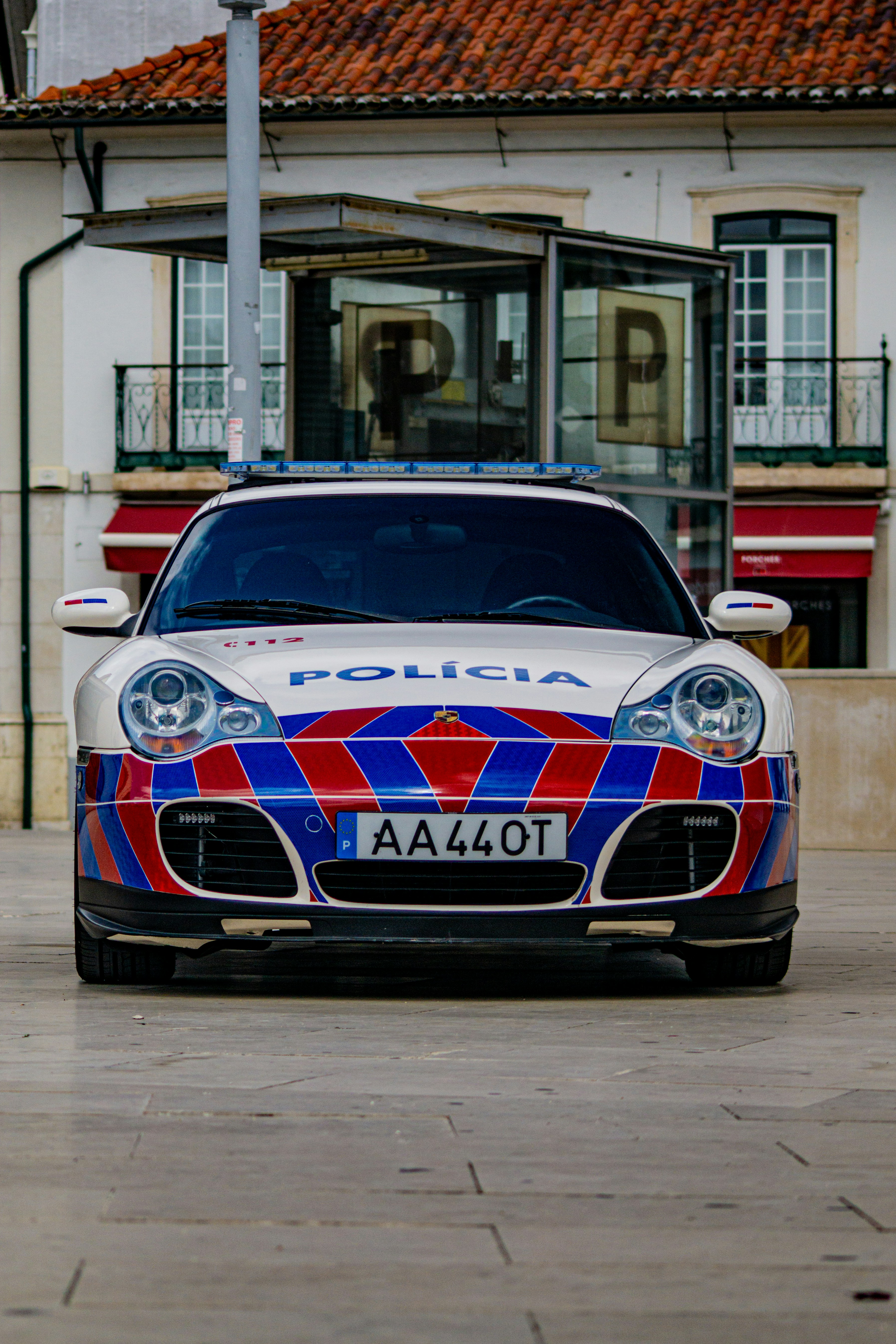 A car parked in front of a building