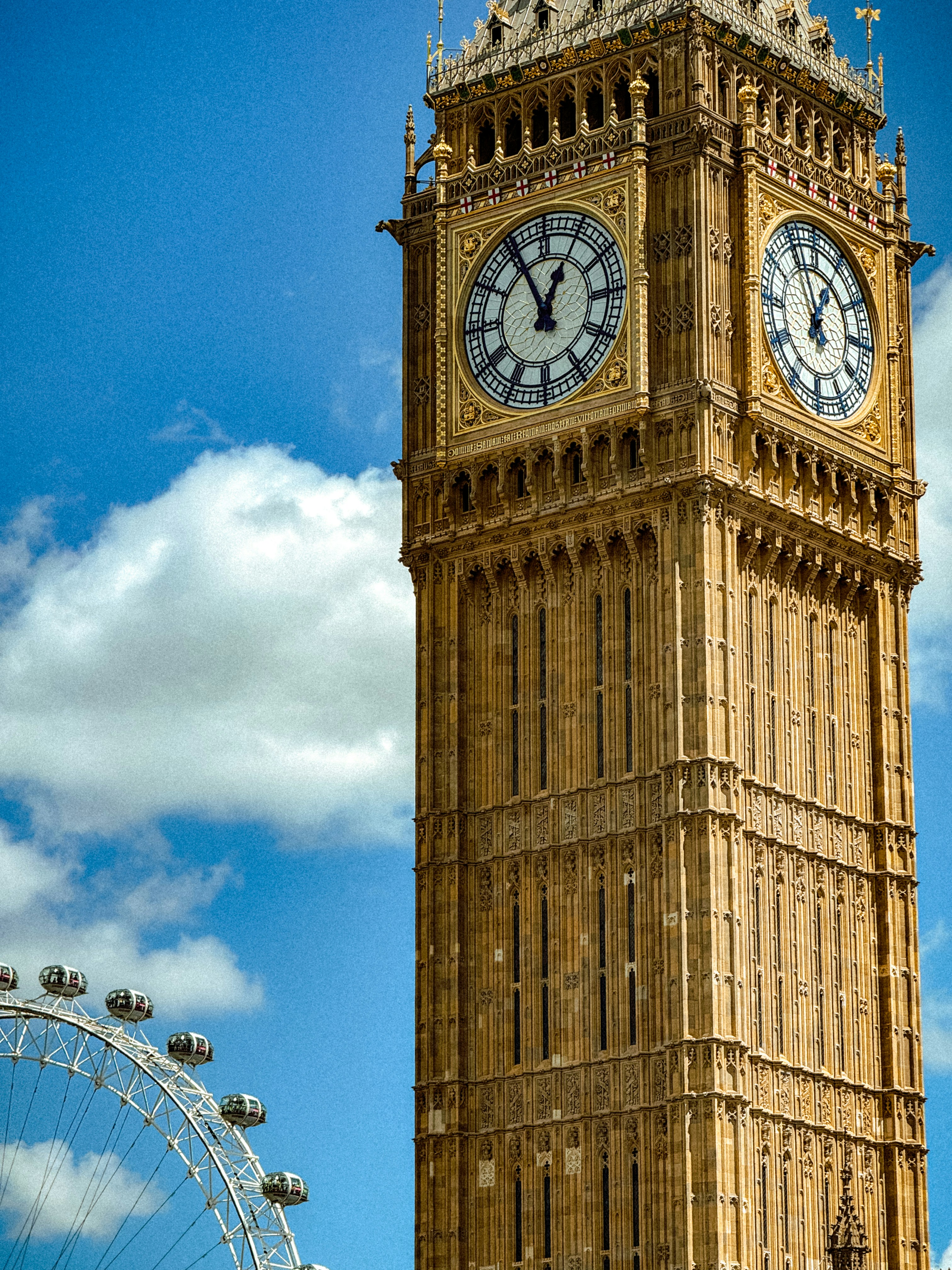 A tall clock tower with a sky background