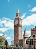 A tall clock tower towering over a city