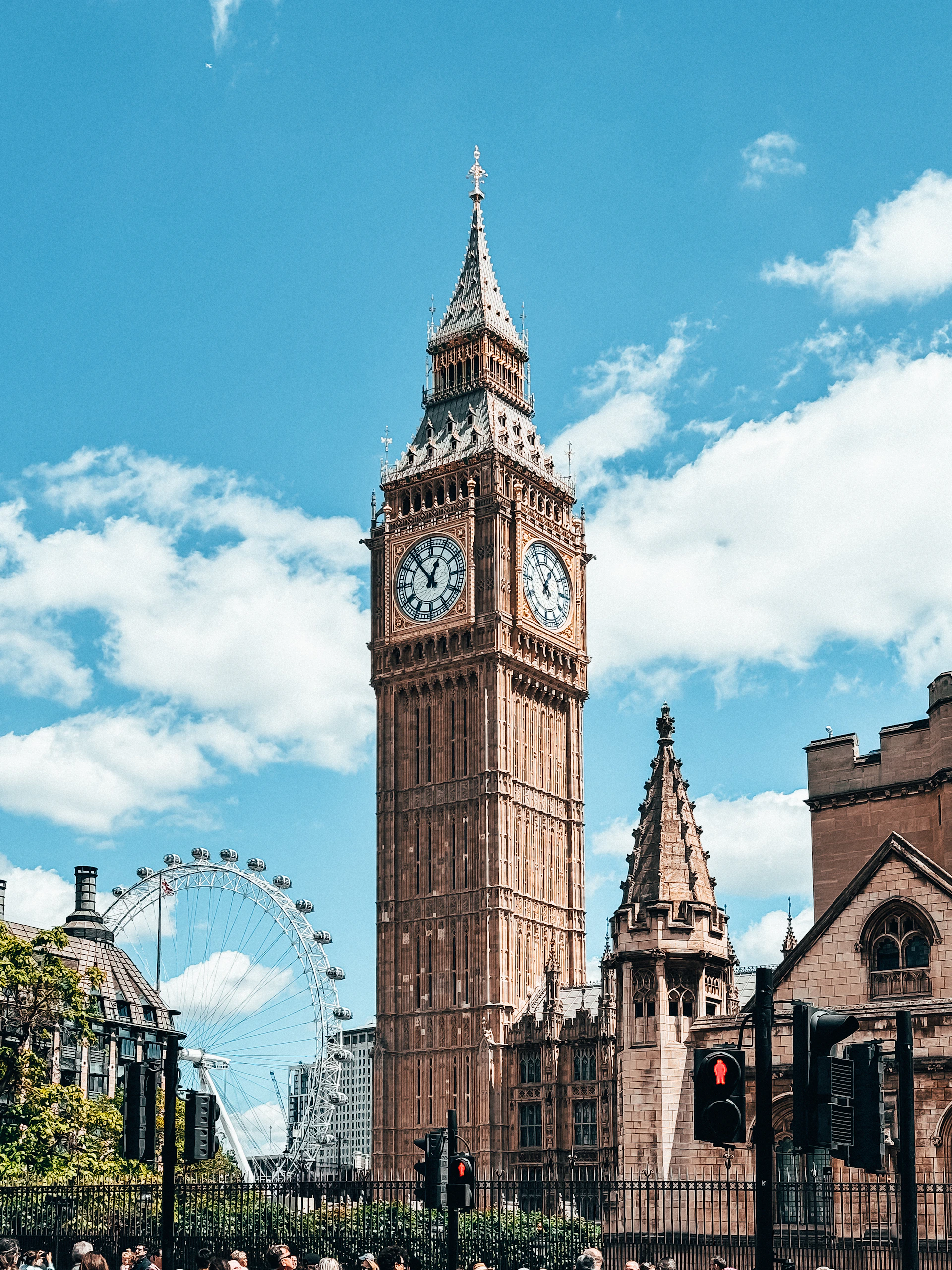 A tall clock tower towering over a city