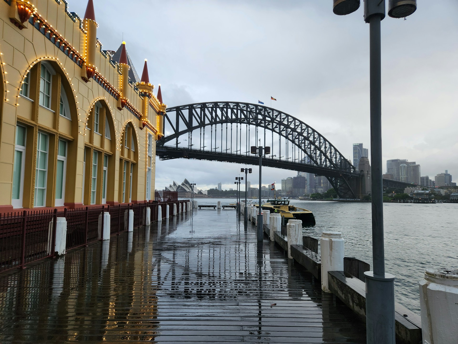 A bridge over a body of water next to a building