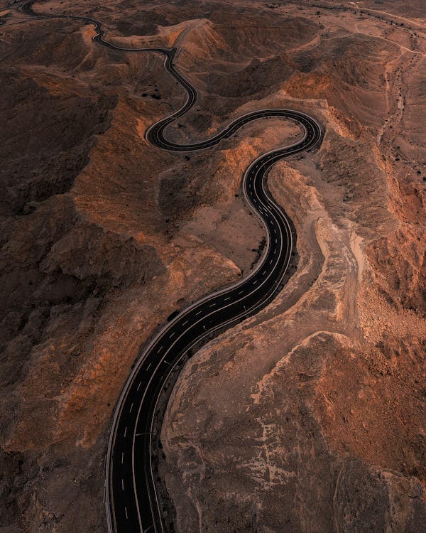 Winding desert road in Al Ain, UAE
