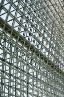 A large metal structure with a clock on it's side