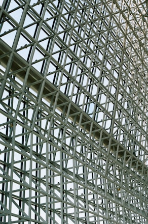 A large metal structure with a clock on it's side