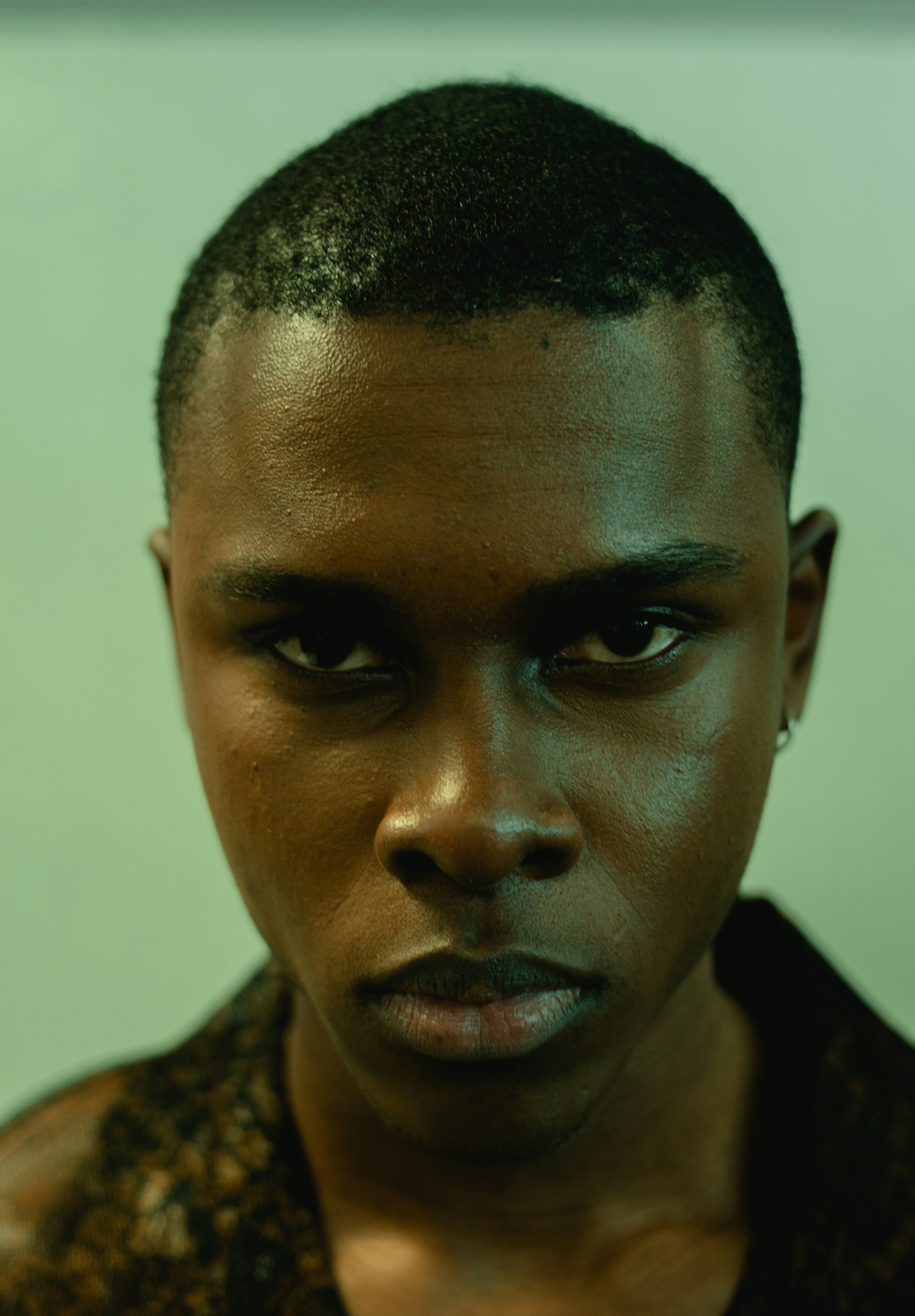 A man with a serious look on his face