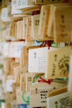 A bunch of wooden boxes with writing on them