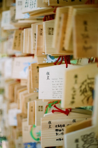 A bunch of wooden boxes with writing on them