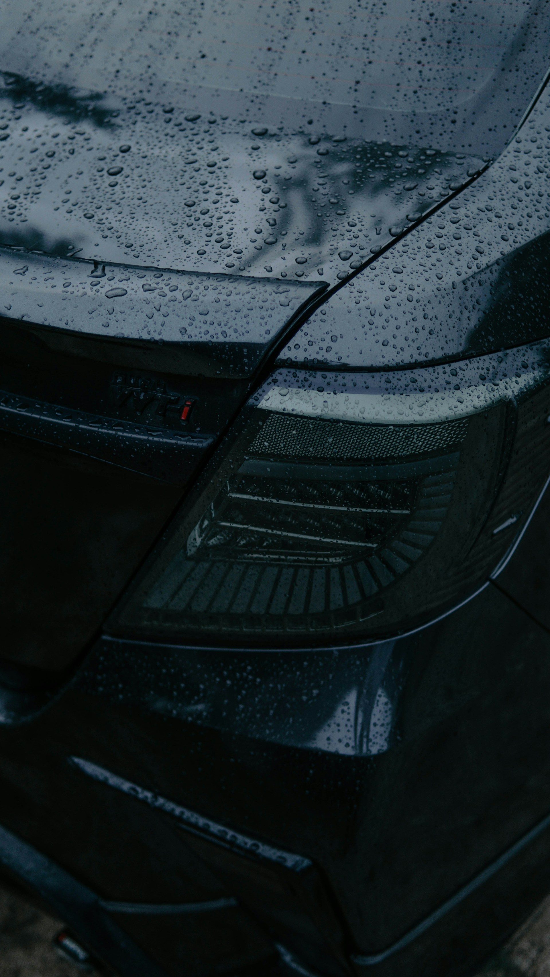 A close up of the front of a black car