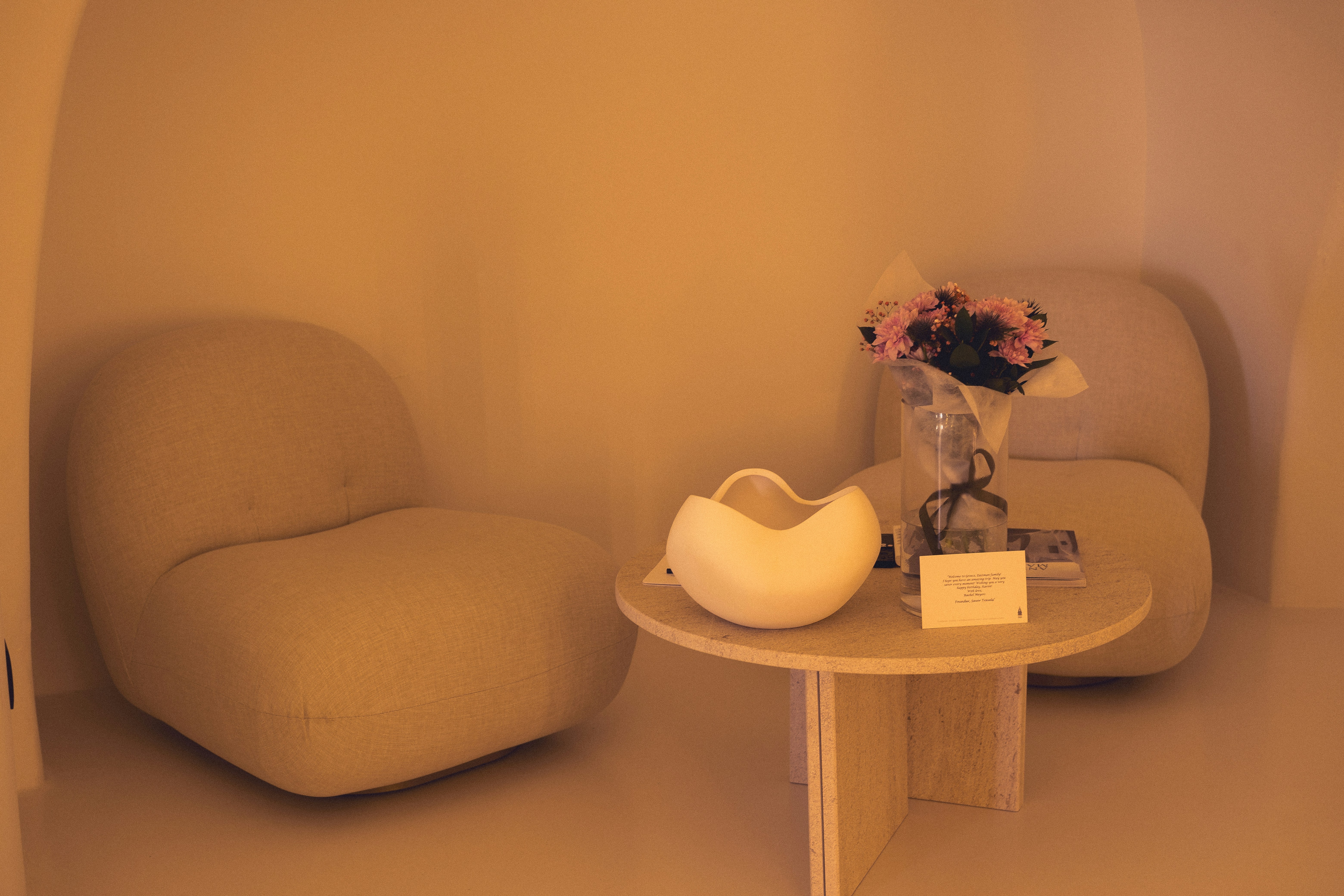 A chair and a table in a room