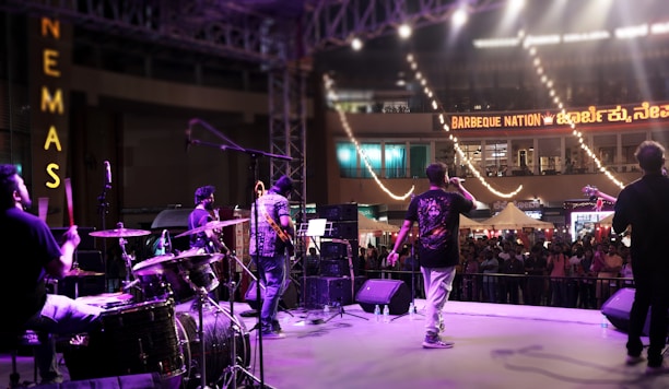 A band performing on stage at a concert