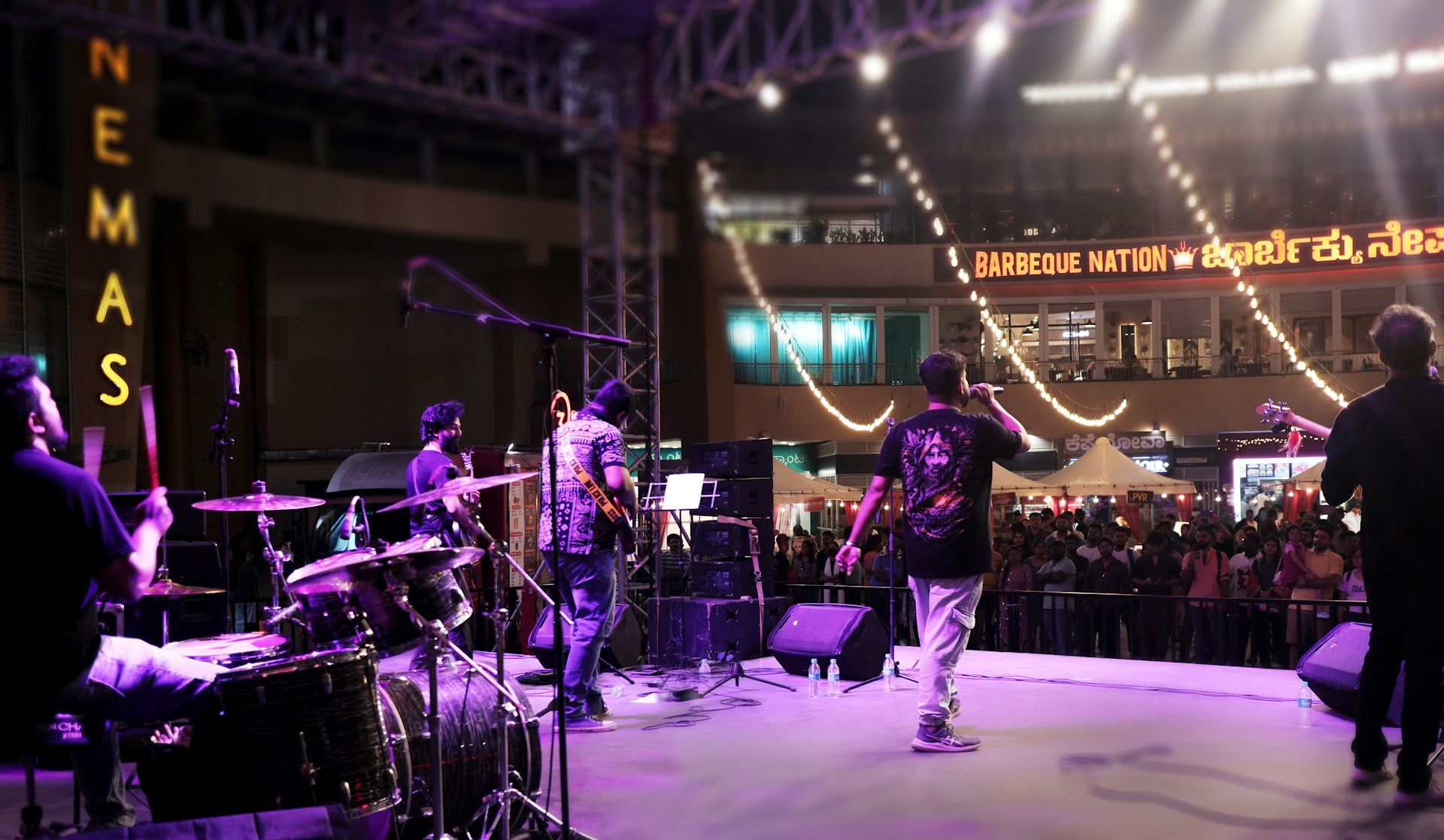 A band performing on stage at a concert