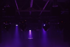 A stage that has some lights on it