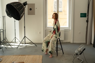 A woman sitting on a chair in a room