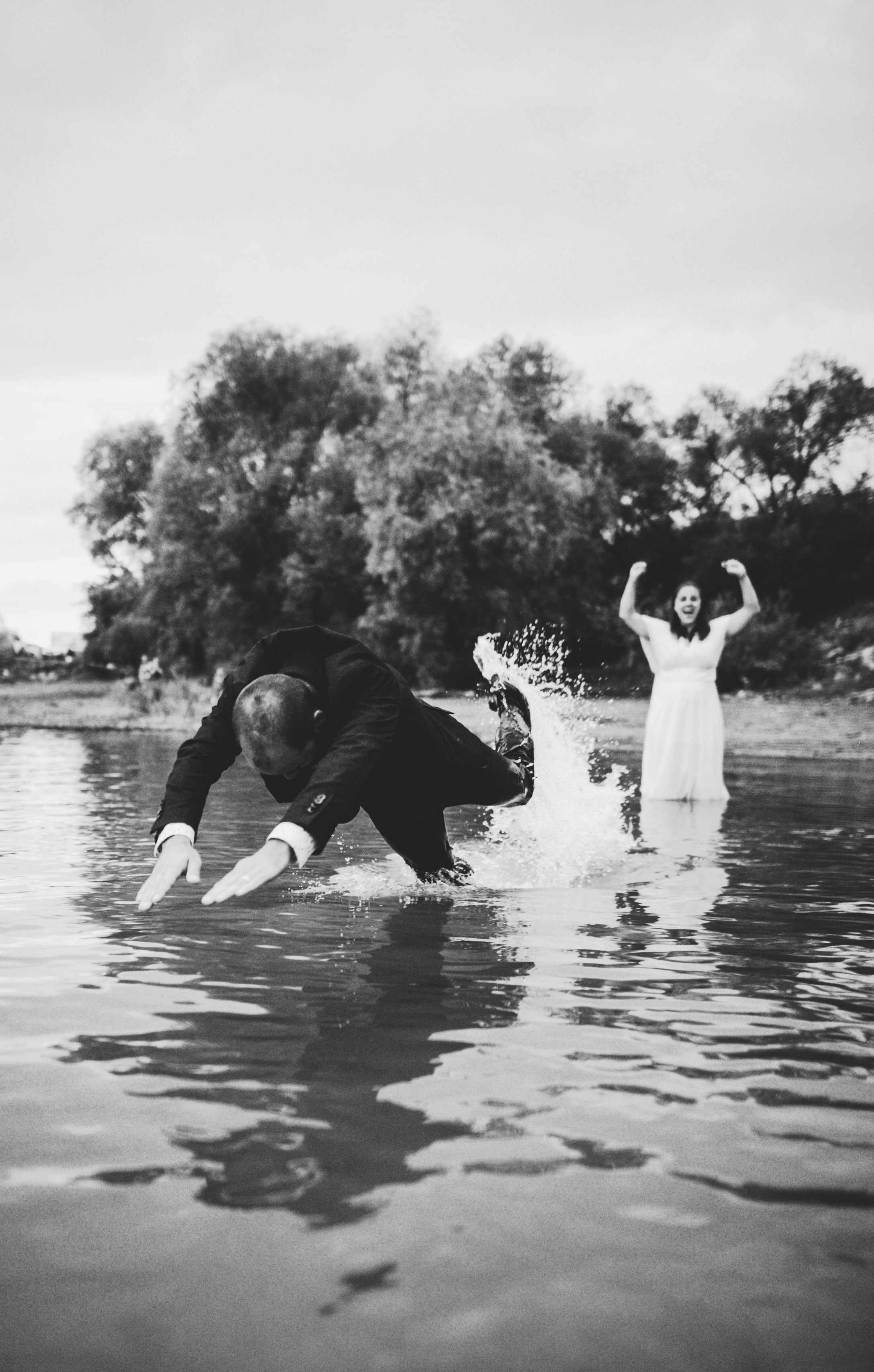 A couple of people that are in the water