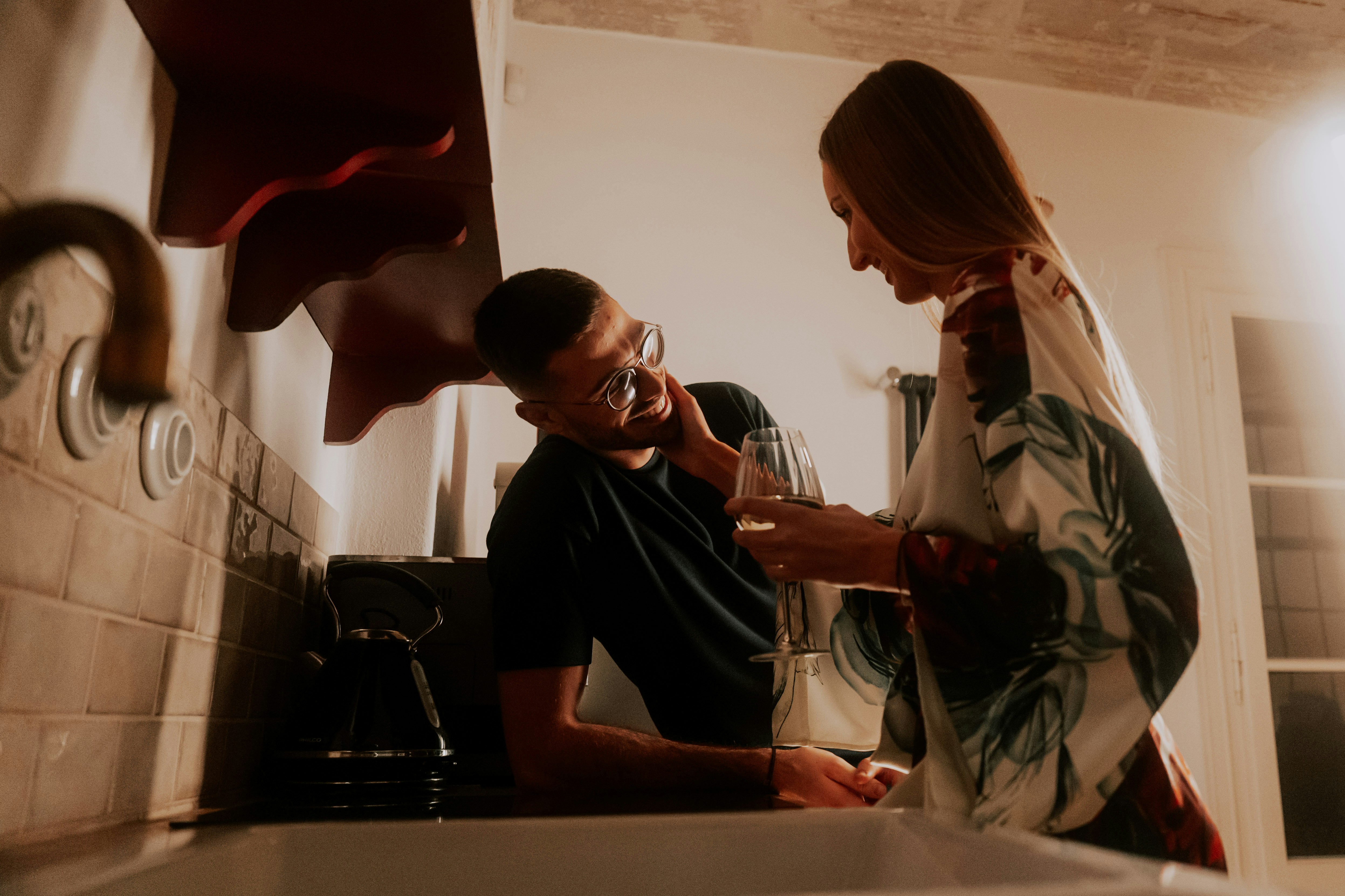 couple getting ready at double vanity sinks - Apartments with double vanity