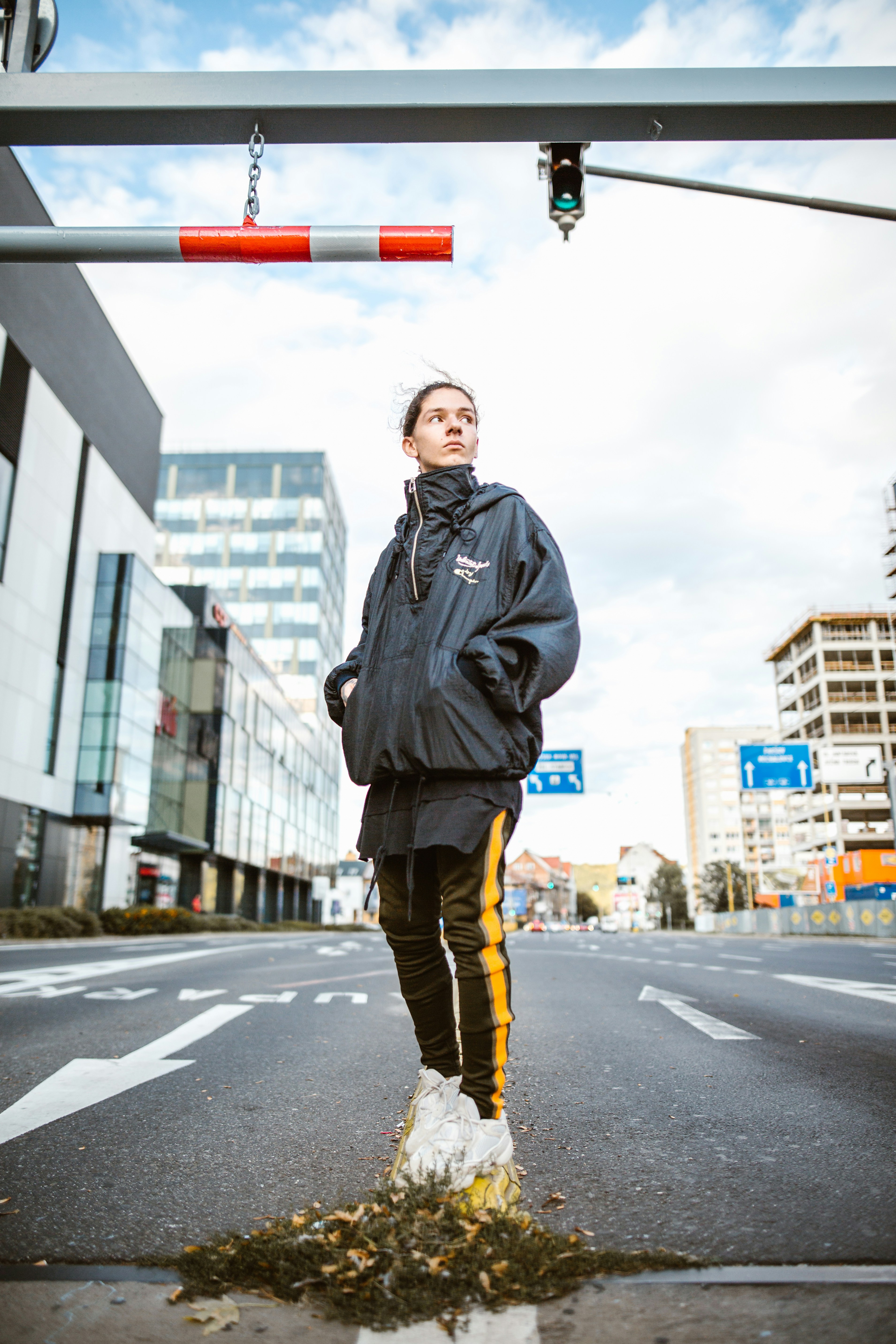 A man standing in the middle of a street