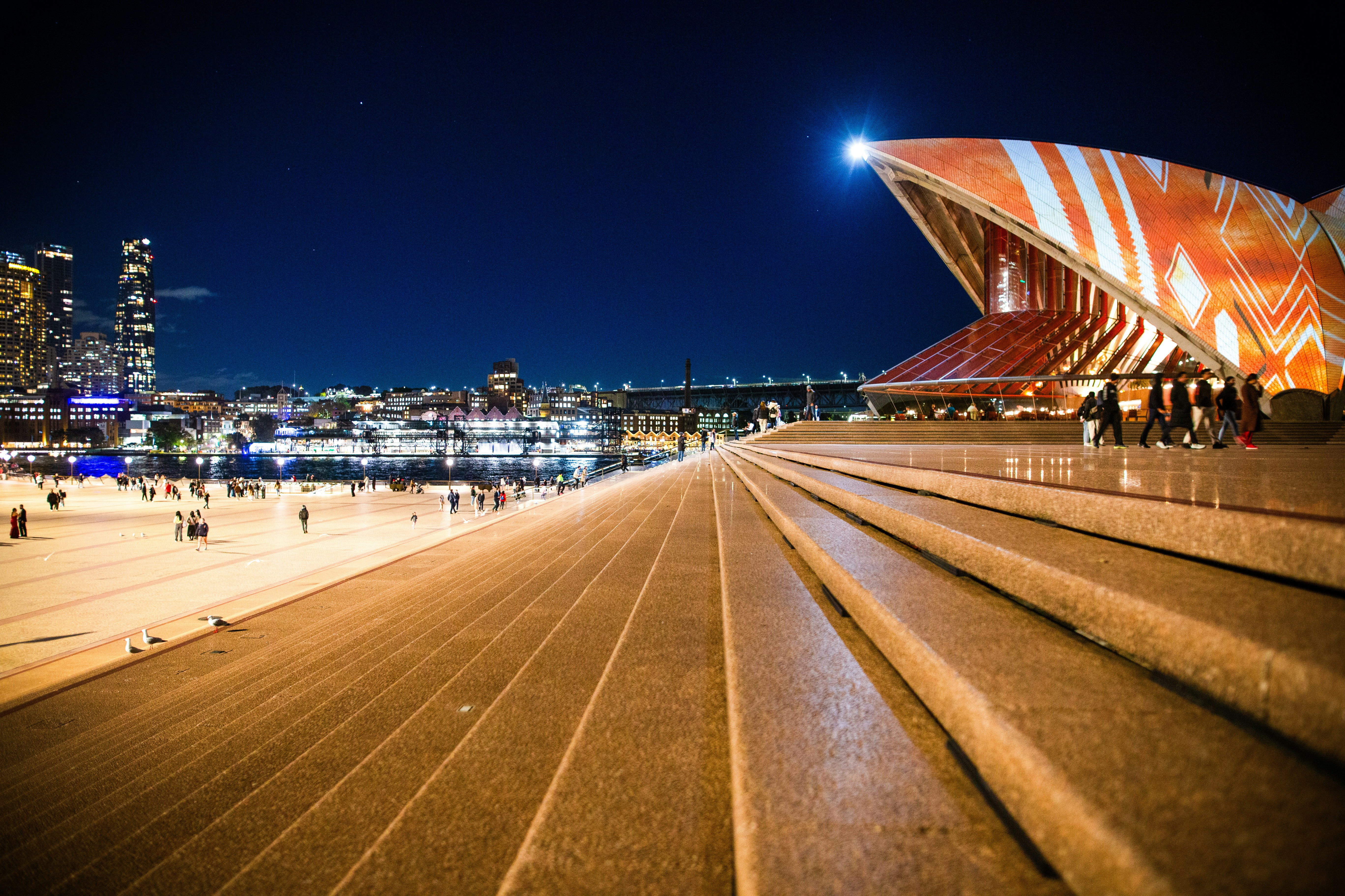 A group of people walking up and down some steps