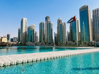 A large body of water with a city in the background