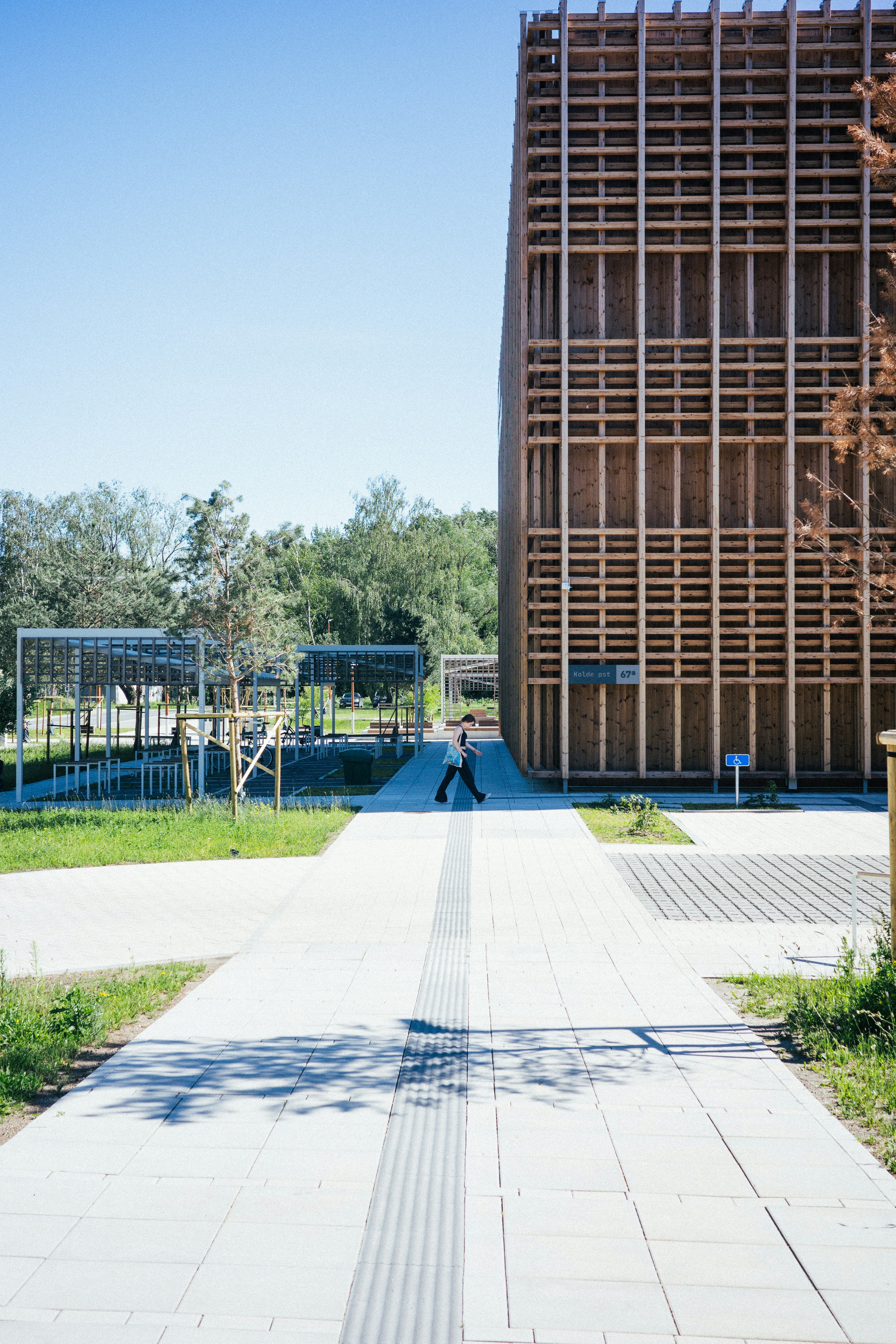 A large building with a wooden structure on top of it