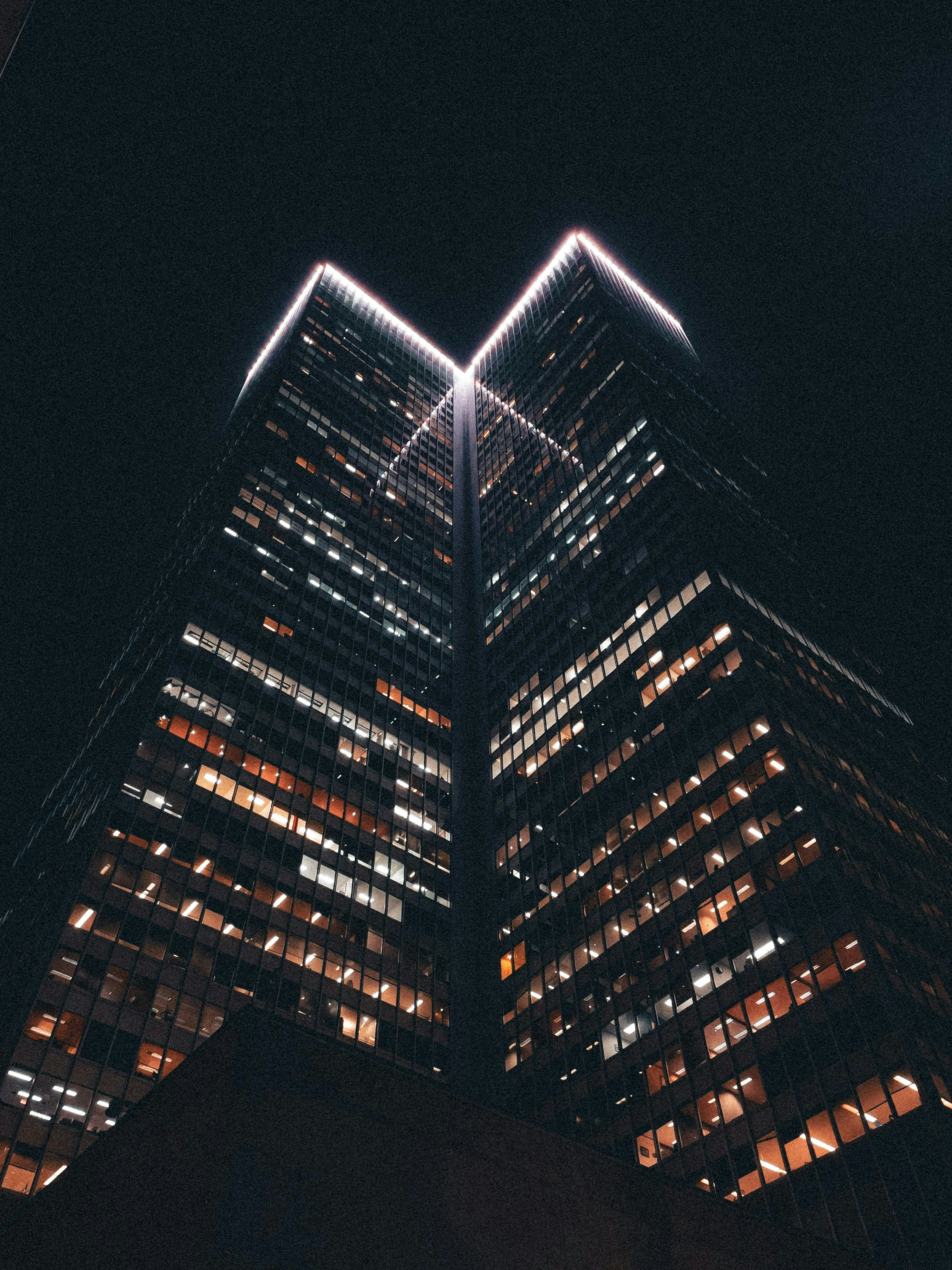 A very tall building lit up at night