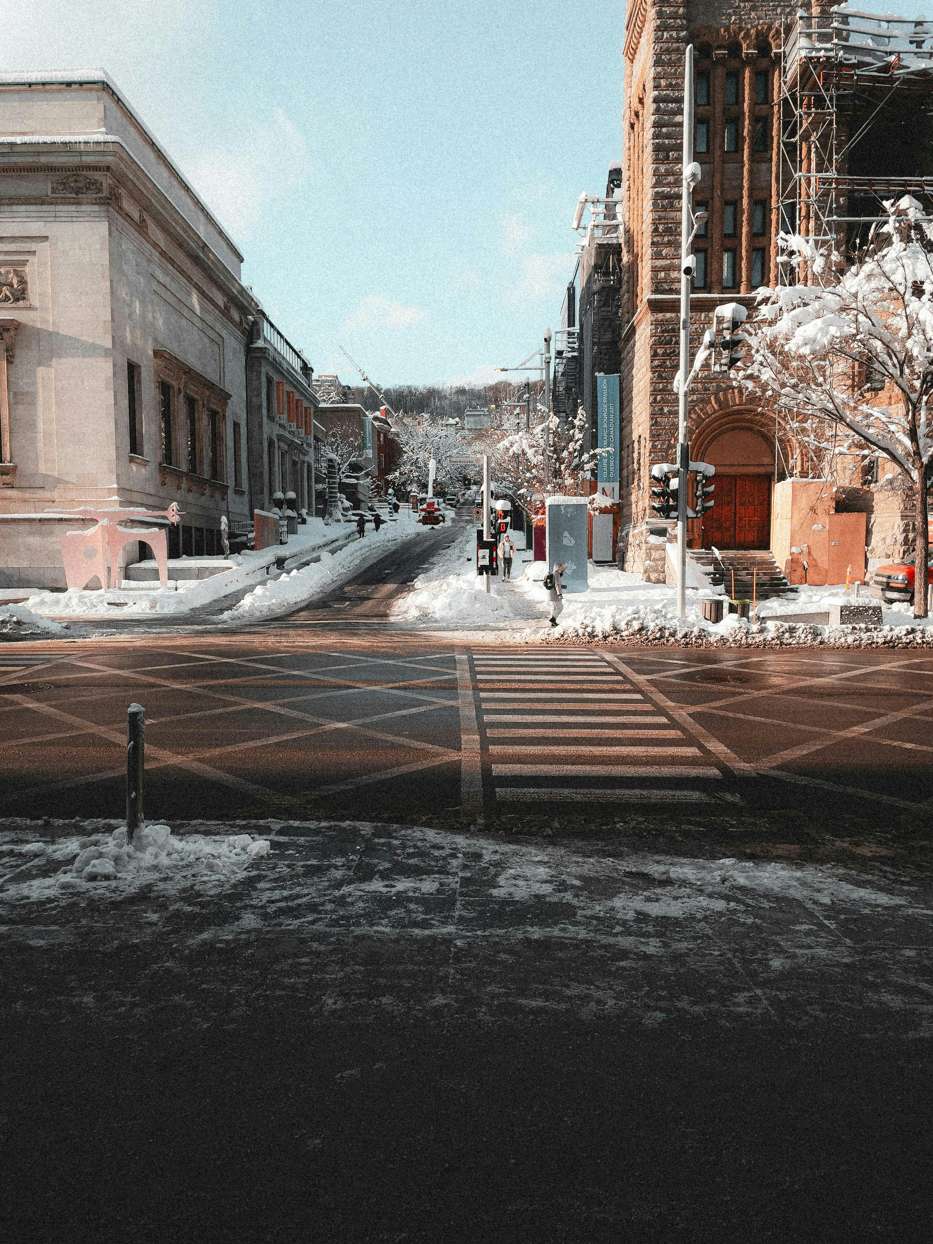 A city street with a few buildings in the background photo – Free City ...
