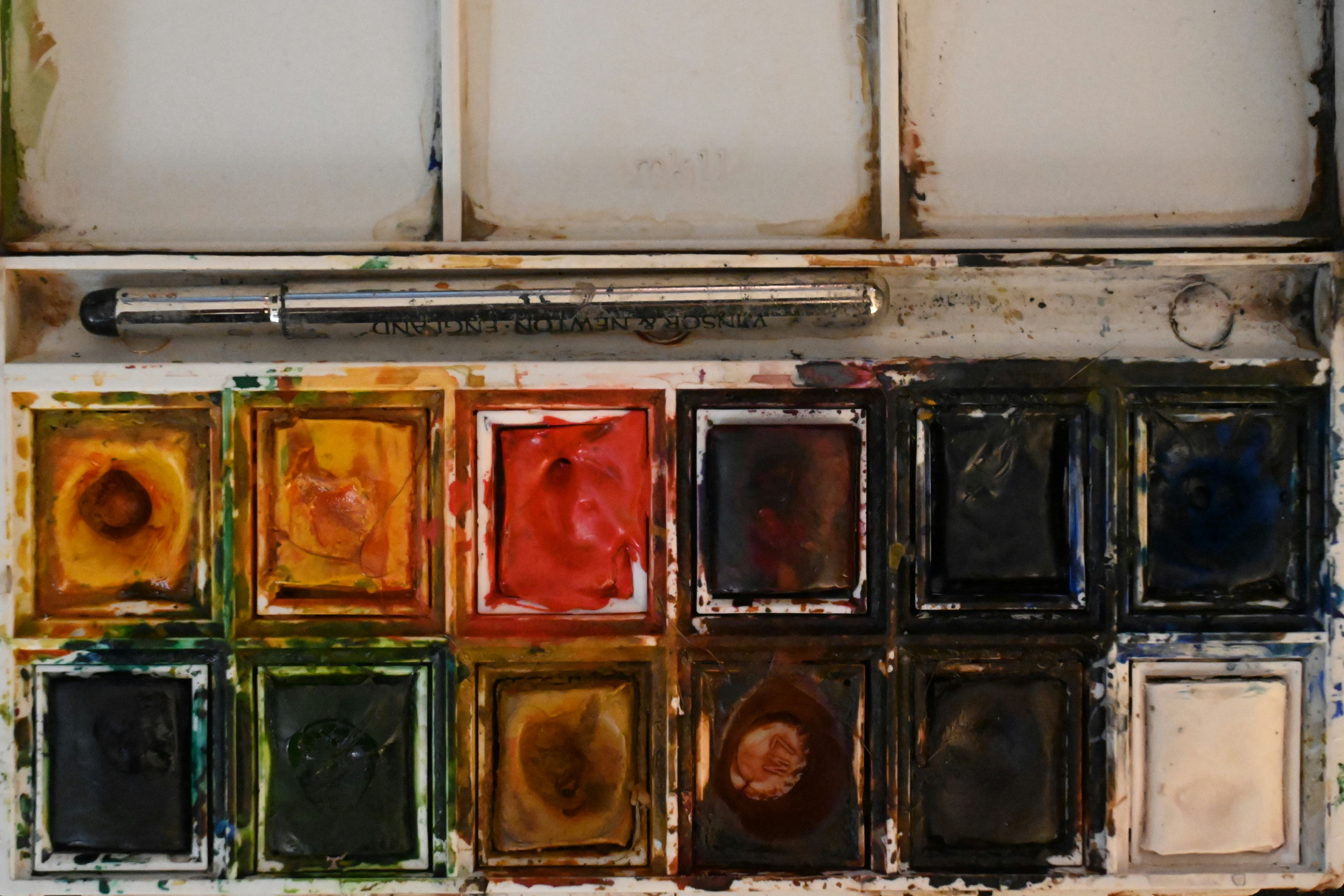 A palette of paint sitting on top of a table